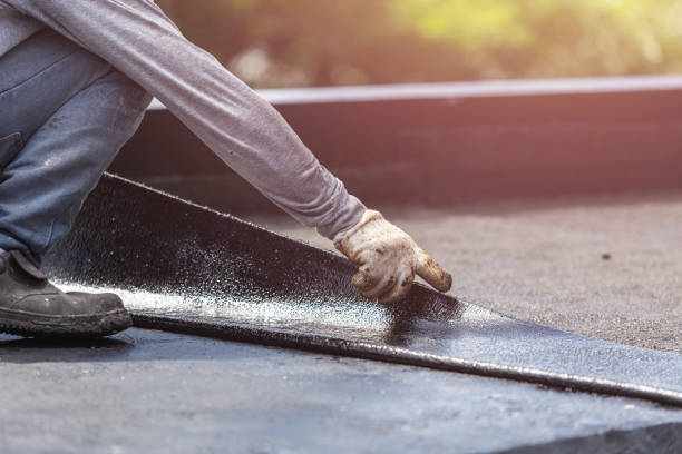 Professional Basement Waterproofing technician working in Cologne, MN